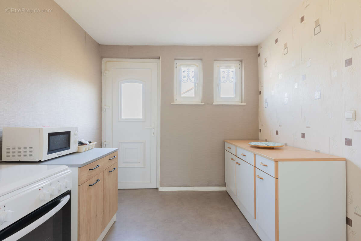 Maison pleine de potentiel - 4 chambres, garage et jardin - photo 7