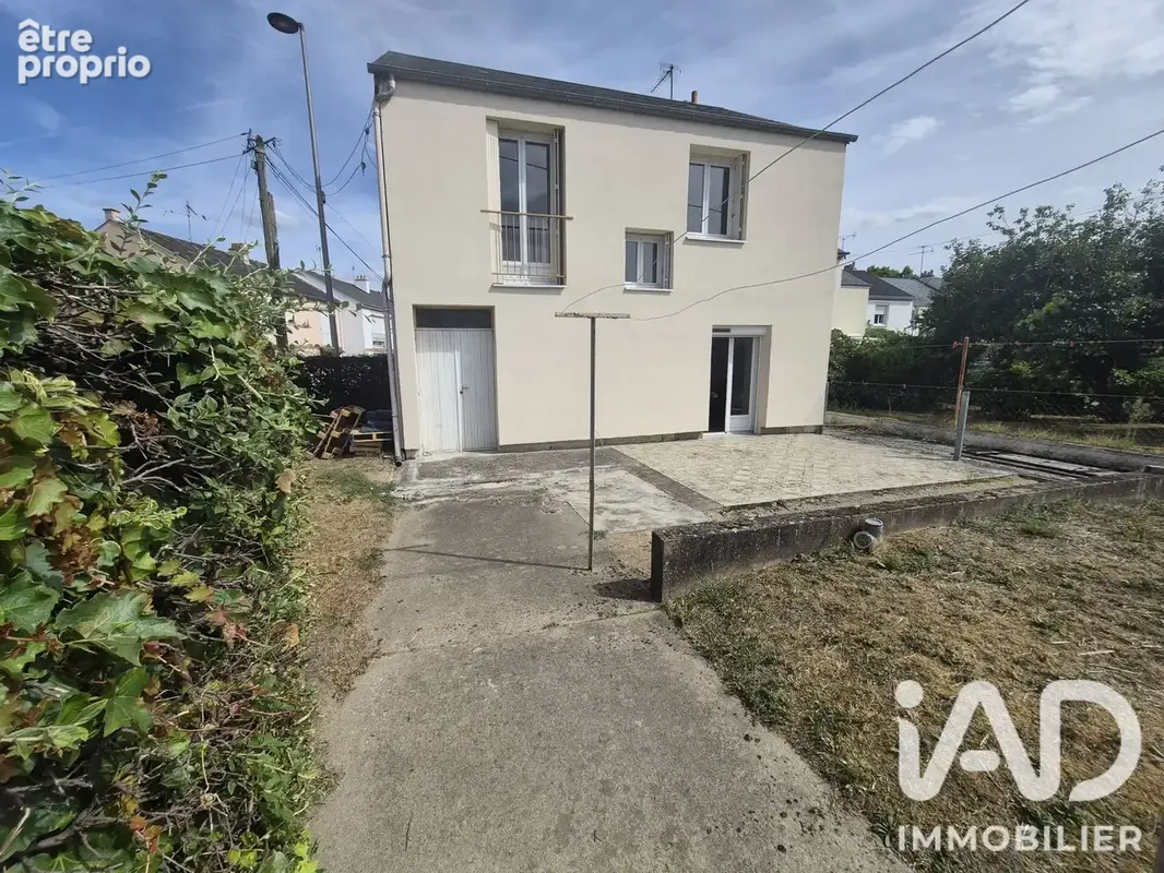Photo 1 - Maison à SAINT-JEAN-DE-LA-RUELLE