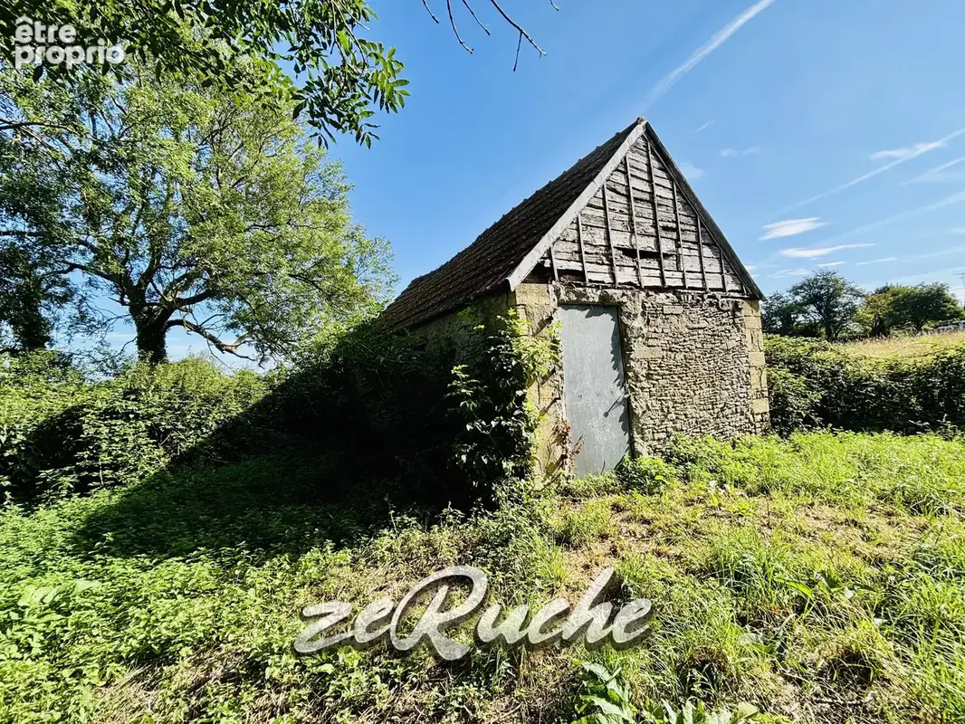 GRANDCAMP-MAISY Authentique corps de ferme en pierre de 180 m² - photo 2