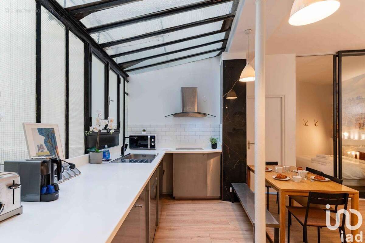 Photo 2 - Commerce à PARIS-6E