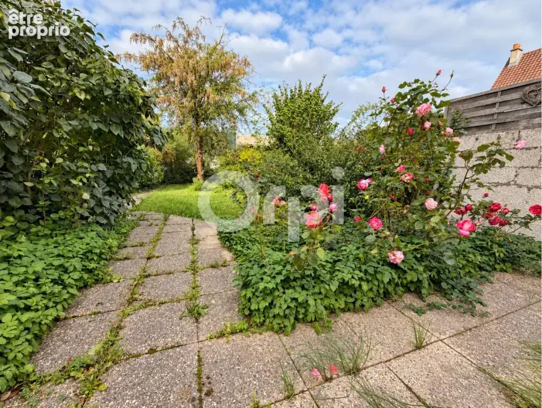  CALAIS – Maison de 107 m² avec 3 chambres, jardin et garage - photo 5