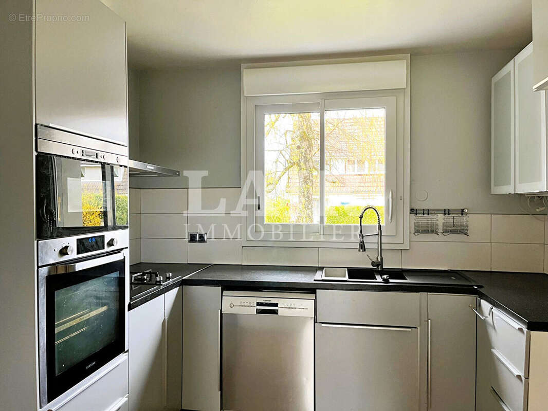 Maison de 122 m² avec jardin et garage - Réf. 15029 - photo 2