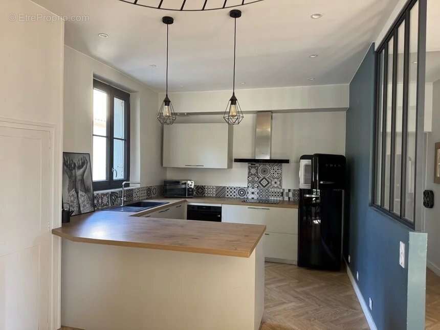 Appartement T4 - A vendre - photo 4