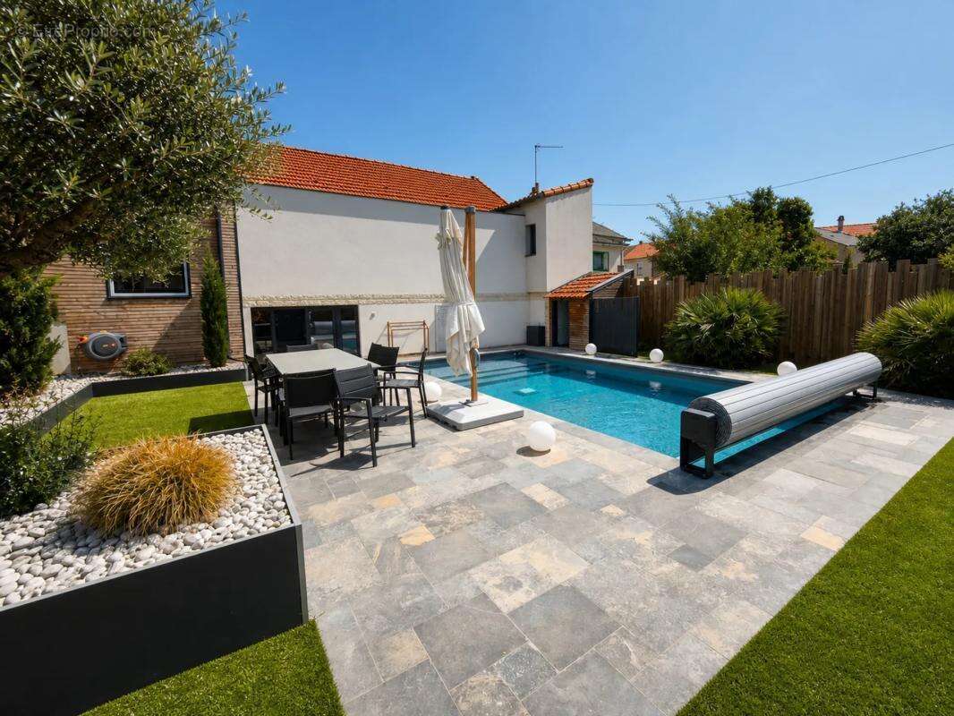 Maison de 10 pièces de 180 m² à Cholet - photo 2