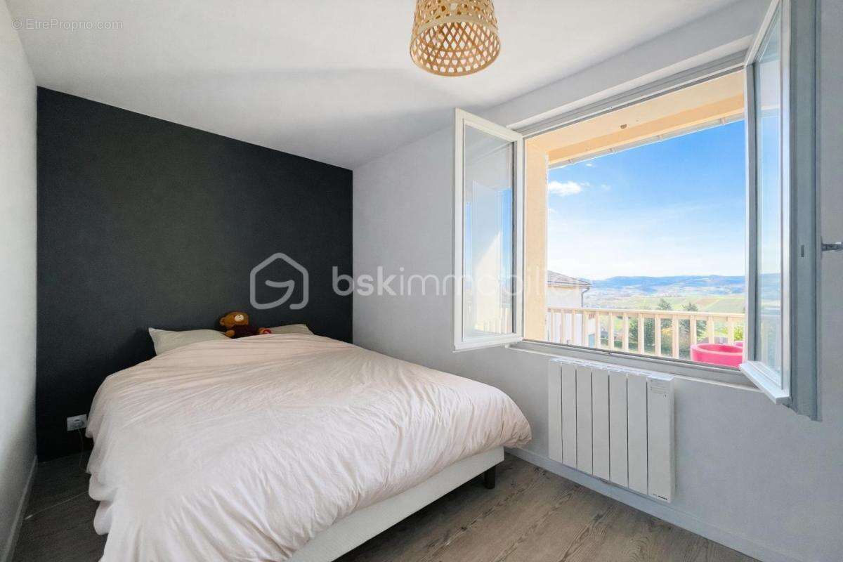 À vendre – Appartement de charme au cœur de Pommiers – 60m² – Vue vignes - photo 6