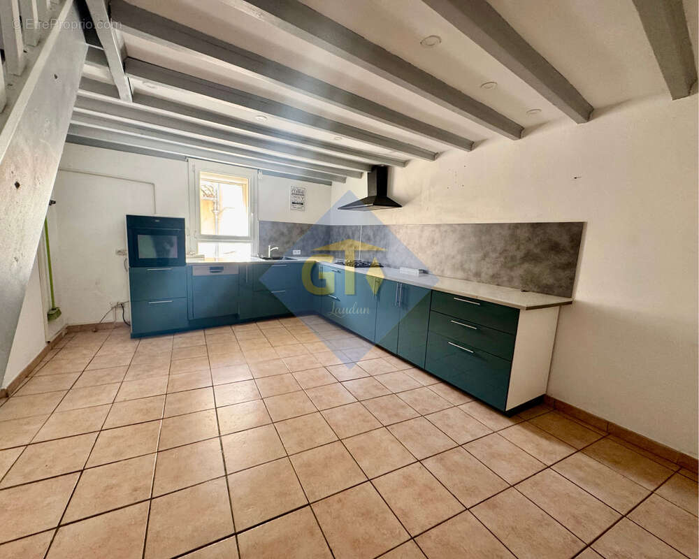 Maison à LAUDUN-L'ARDOISE