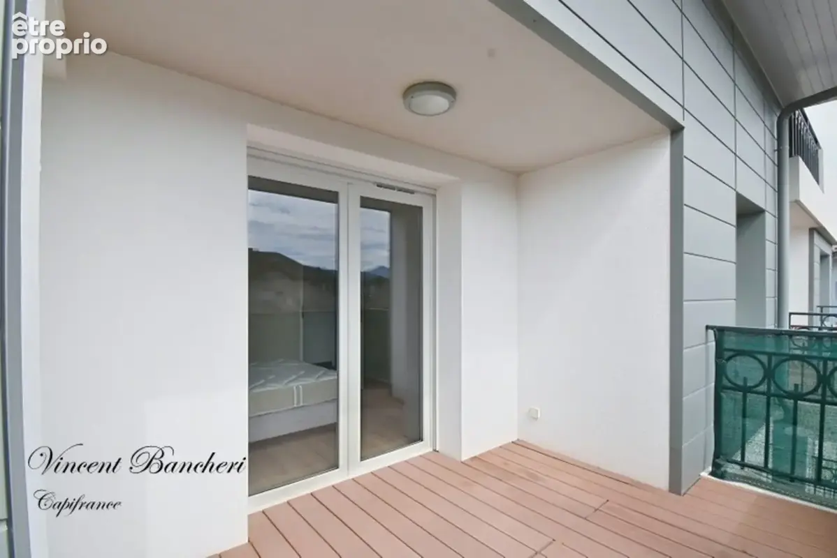 Appartement à vendre 3 pièces REIGNIER (74) avec Terrasse, 2 places de parkings et cave - photo 2