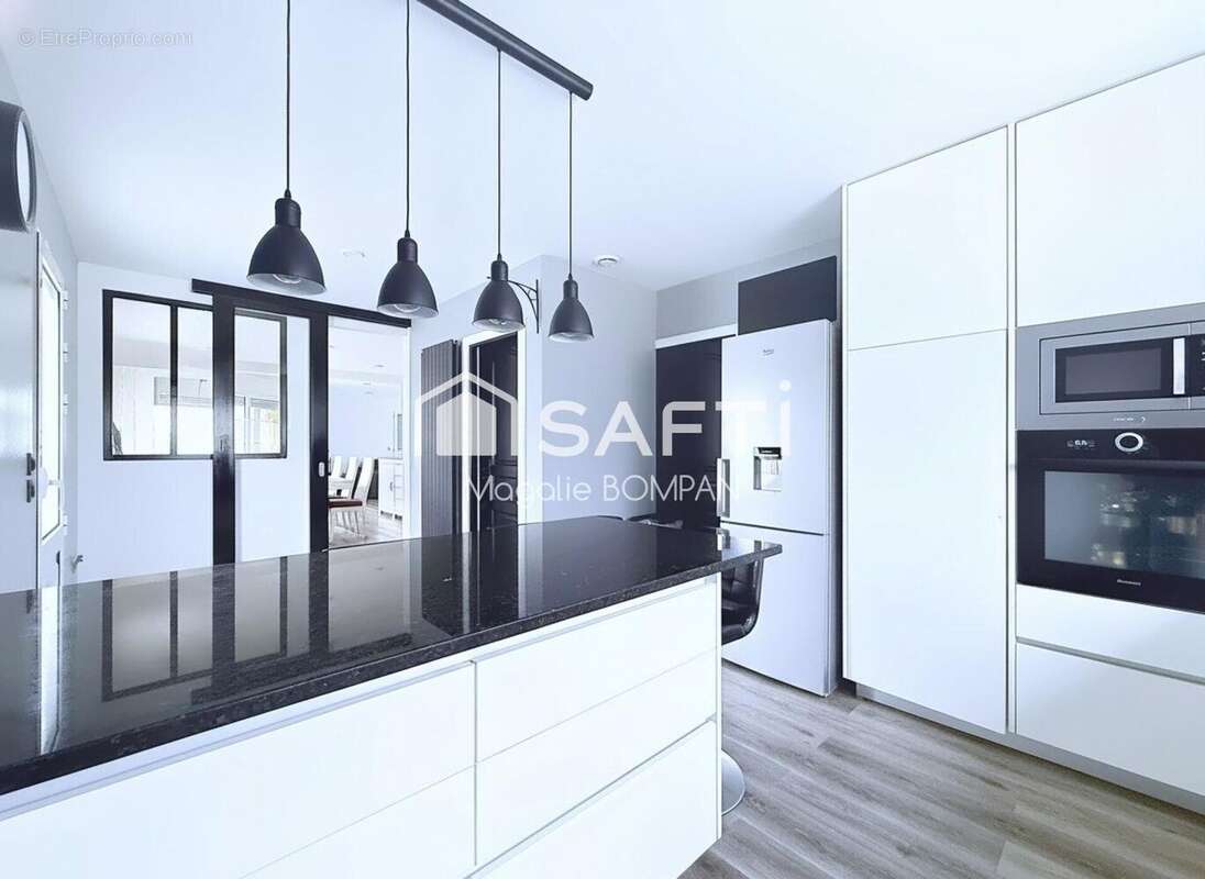 Photo 2 - Maison à SAINTE-HELENE