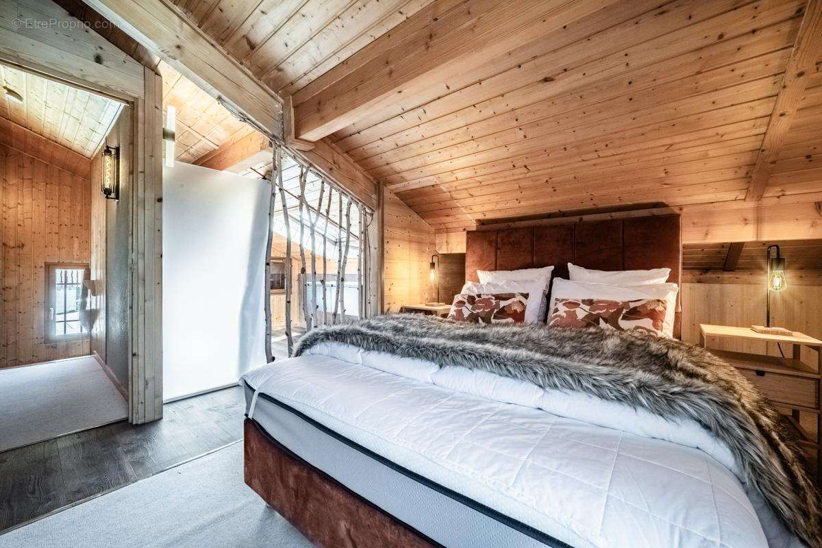 Un chalet alpin magnifiquement aménagé offrant une vue panoramique, idéalement situé à Chavannes - photo 13