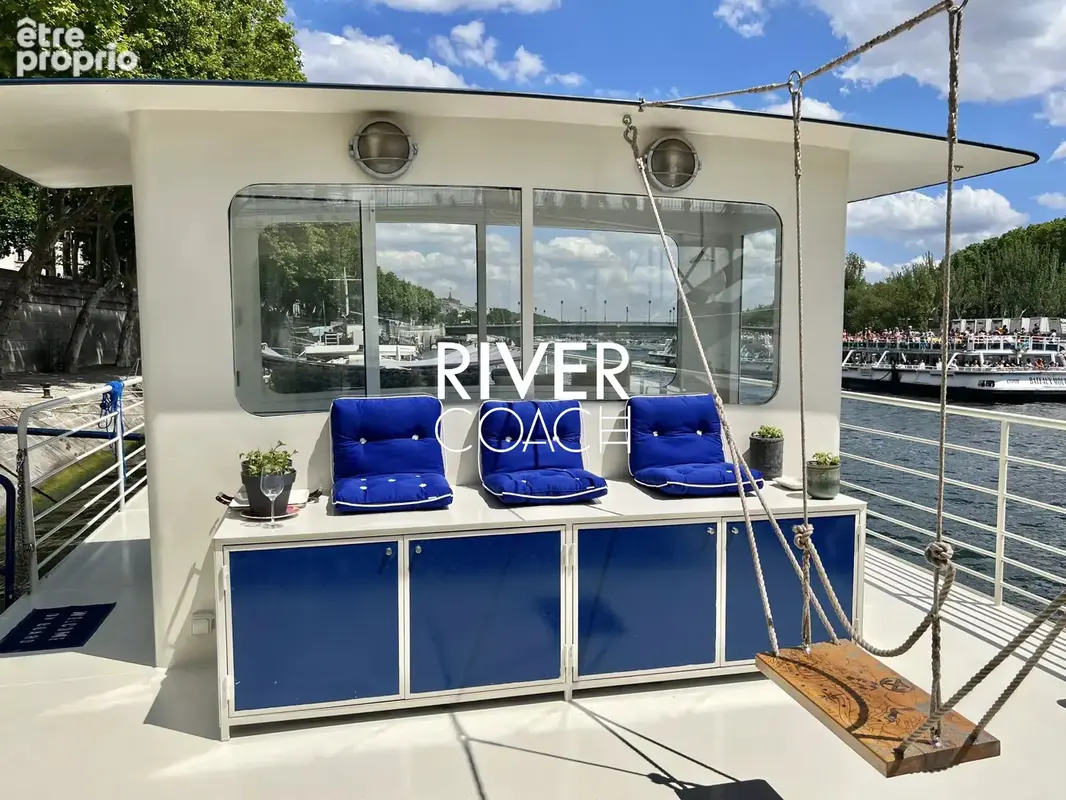 Péniche d’Exception de 150 m² avec Terrasse et Vue Iconique à Paris - photo 18