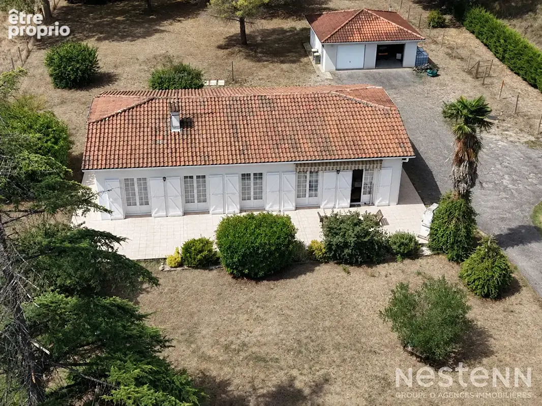 A Vendre Maison de plain-pied de 136 m² avec double garage sur terrain arboré d'environ 4 800 m² - photo 20