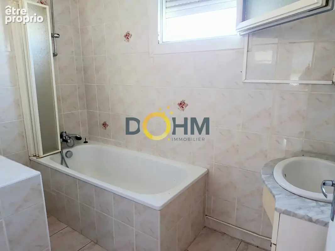 Maison de 102m2 mitoyenne d'un coté - photo 6