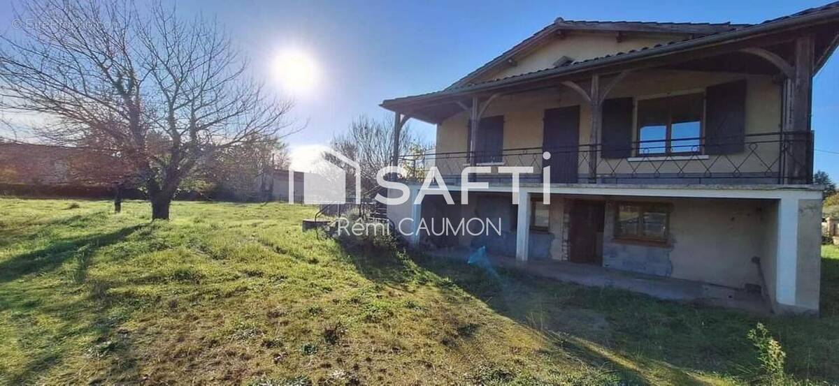 Photo 1 - Maison à PUY-L'EVEQUE