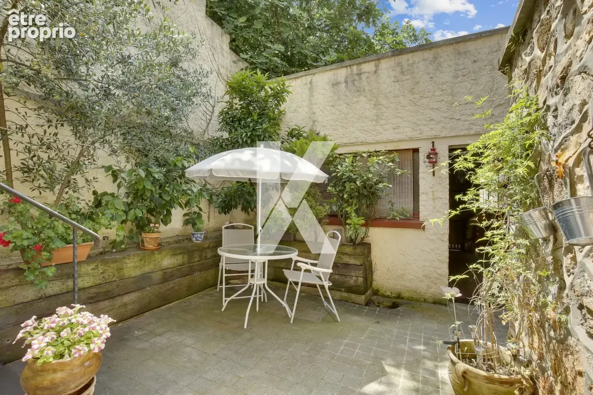 Terrasse avec accès garage