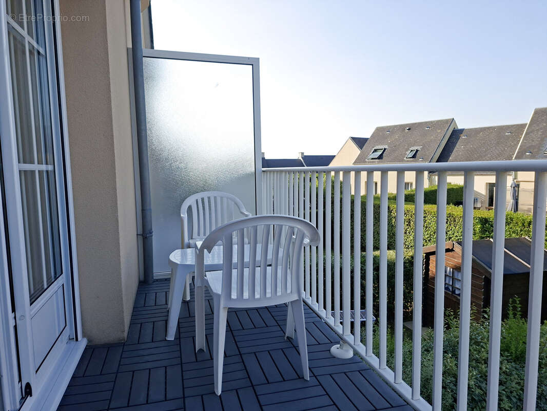 Appartement duplex avec balcon et 2 places de parking - photo 4