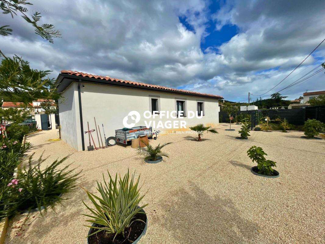 Maison à SAINT-JULIEN-LES-ROSIERS