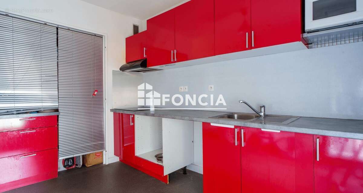 Appartement T3 de 64 m² avec balcons, parking et cave – Rue Casimir Rançon - photo 3