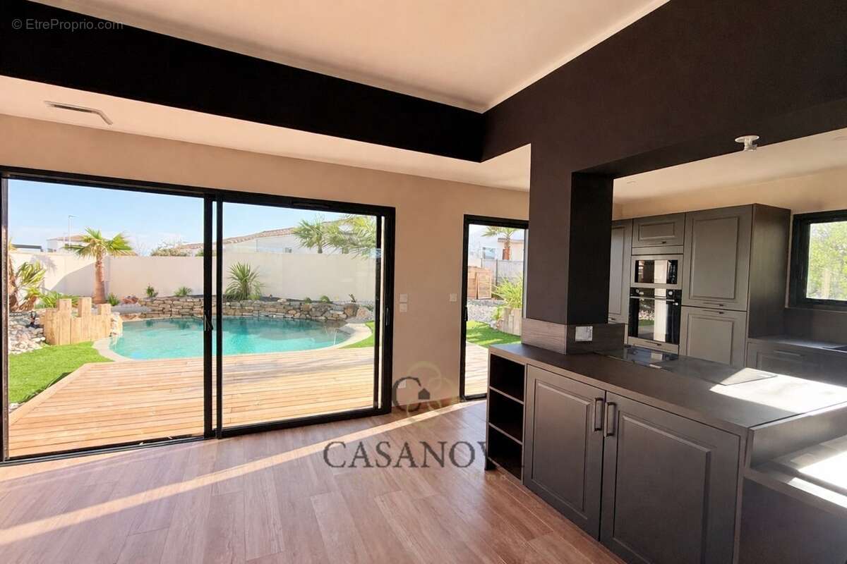 Villa contemporaine neuve avec piscine lagon et vue campagne à Magalas - photo 7