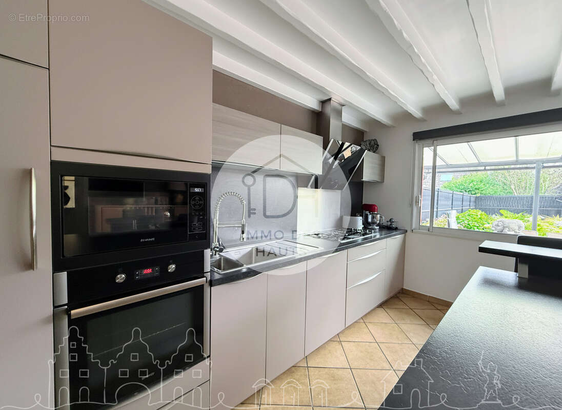 Maison familiale de 100 m2 avec jardin et garage à Steenvoorde - photo 4
