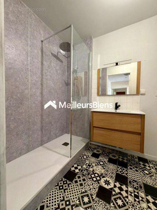 LAVAL – Rive Droite  Résidence Les Charmilles  Appartement T4 de 99 m² avec ascenseur, parking et parc privé - photo 16