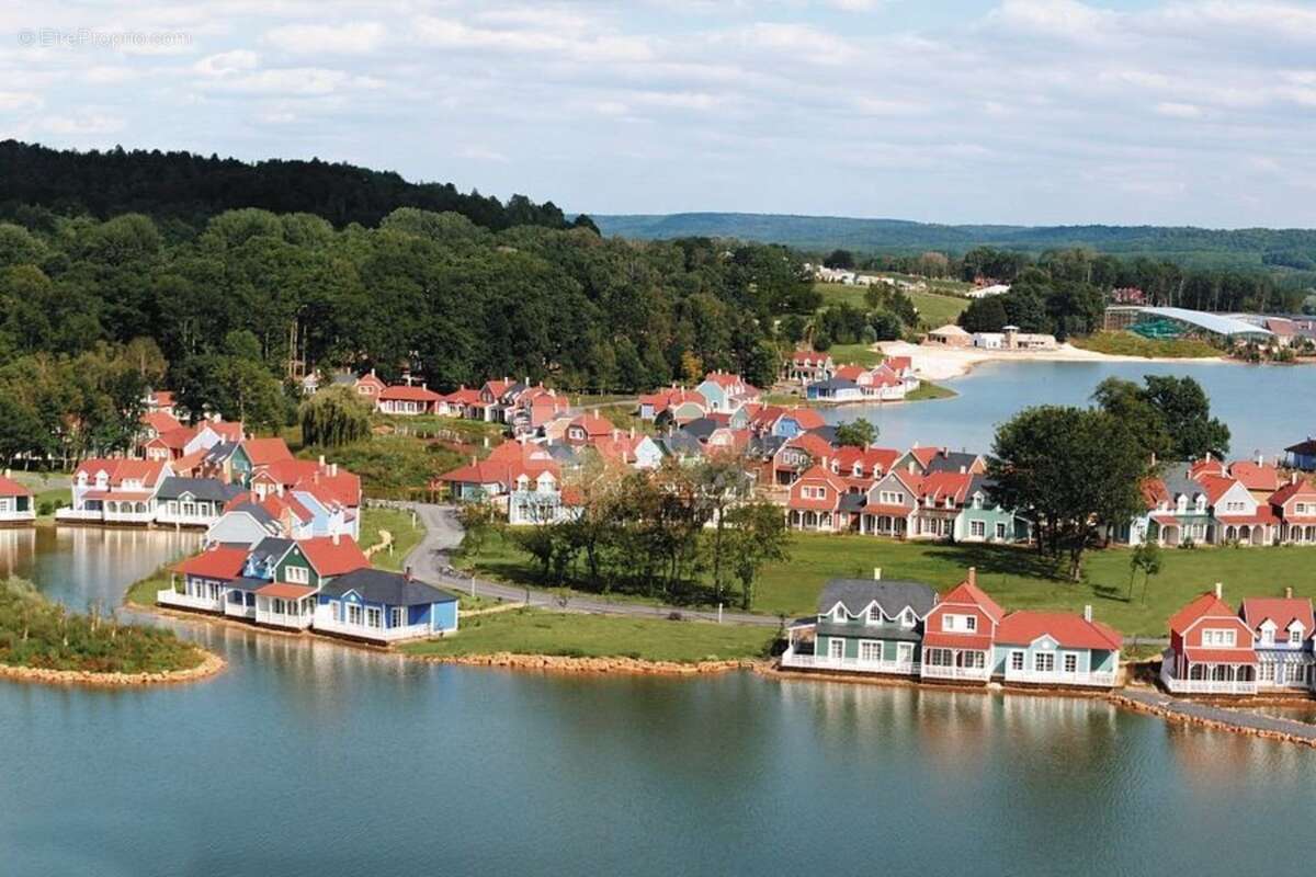 INVESTISSEMENT LOCATIF  CHAMOUILLE  Résidence de tourisme Center Parcs Le Lac d'Ailette - 7 % de rentabilité - photo 19