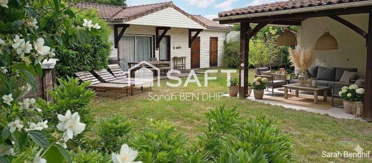 Photo 1 - Maison à LE TUZAN