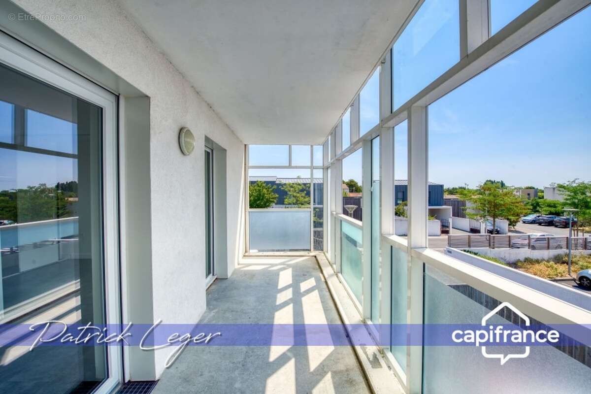 PÉRIGNY (17) – Élégant T3 modulable avec grande terrasse couverte & parking sous-sol - photo 13