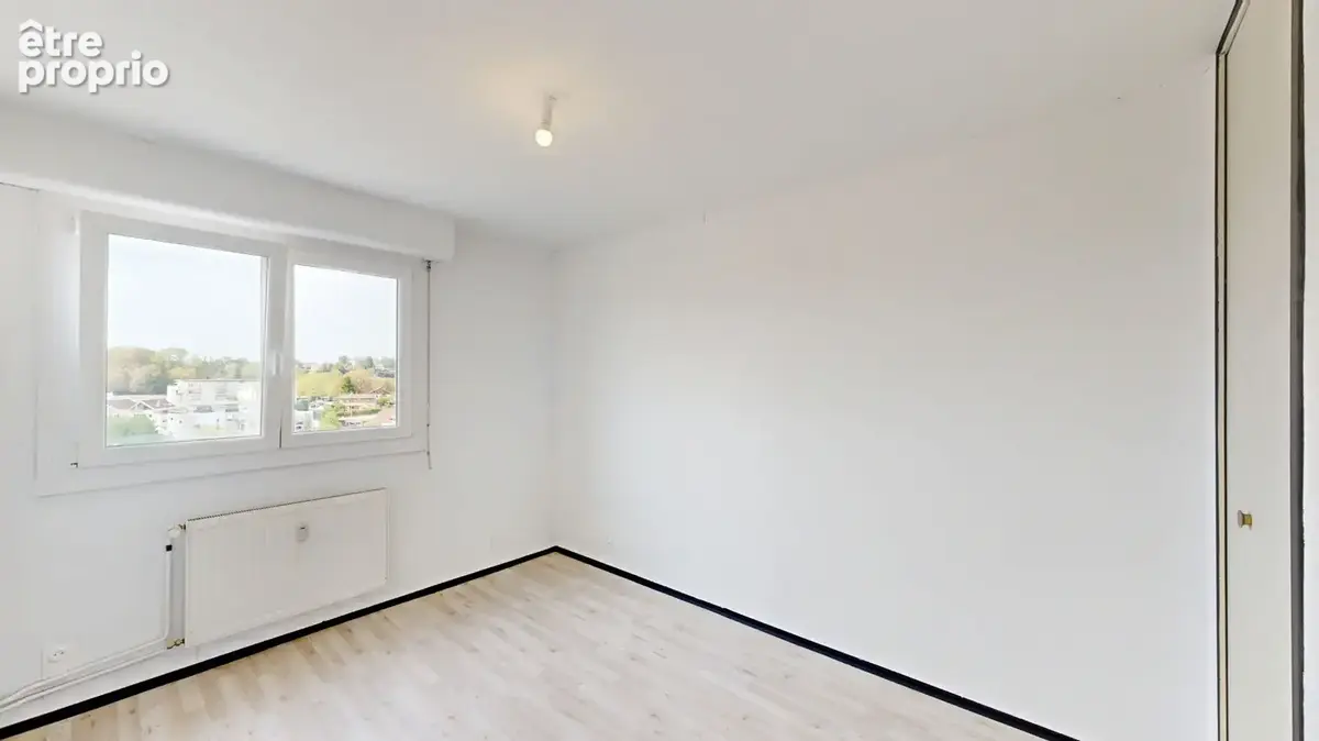 Appartement 4 pièces à vendre à Besançon - 10ème étage avec vue panoramique - photo 8
