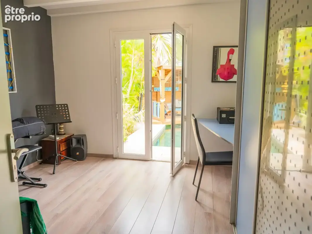 Maison 5 pièces 130 m² à vendre à Saint-Paul (97460) - photo 8