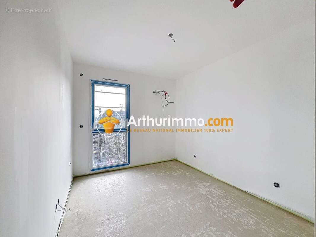 Appartement à VAULX-MILIEU
