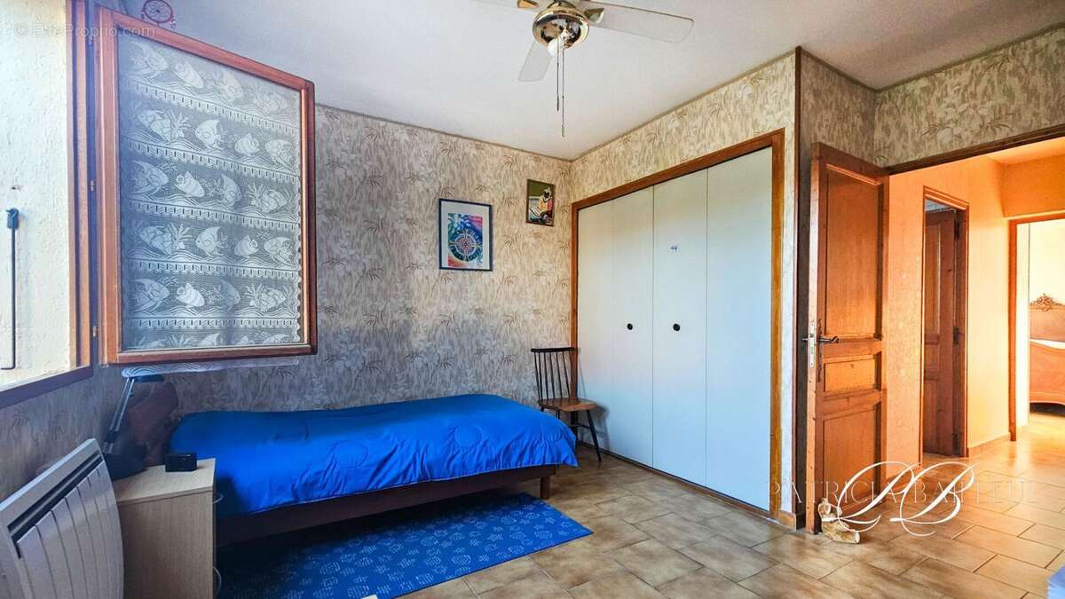 Maison à THEZA