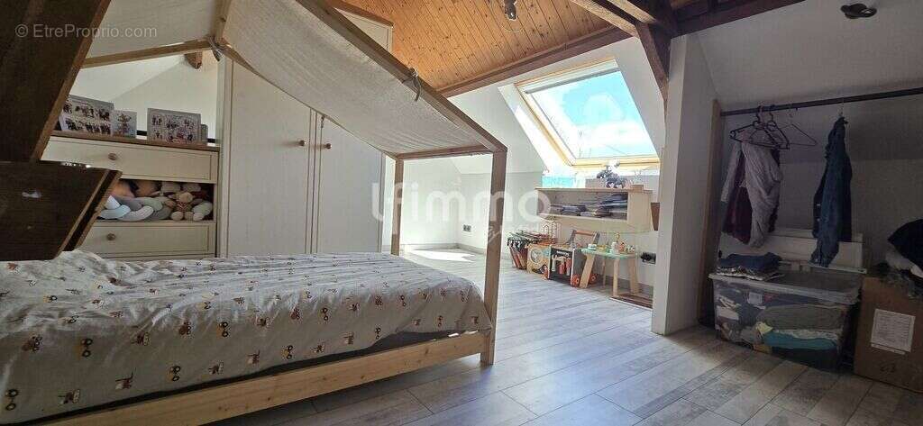 Maison avec jardin et garage – Une belle opportunité à saisir ! - photo 14