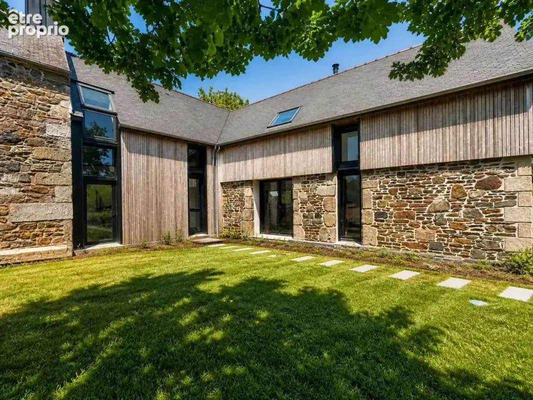 Maison de 7 pièces de 184 m² à Gurunhuel - photo 2