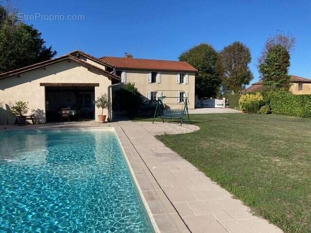 Restored farmhouse exterior near Trie-sur-Baïse Façade de la ferme rénovée près de Trie-sur-Baïse Bauernhaus außenansicht bei Trie-sur-Baïse Gerestaureerde boerderij voorgevel bij Trie-sur-Baïse - Maison à TRIE-SUR-BAISE
