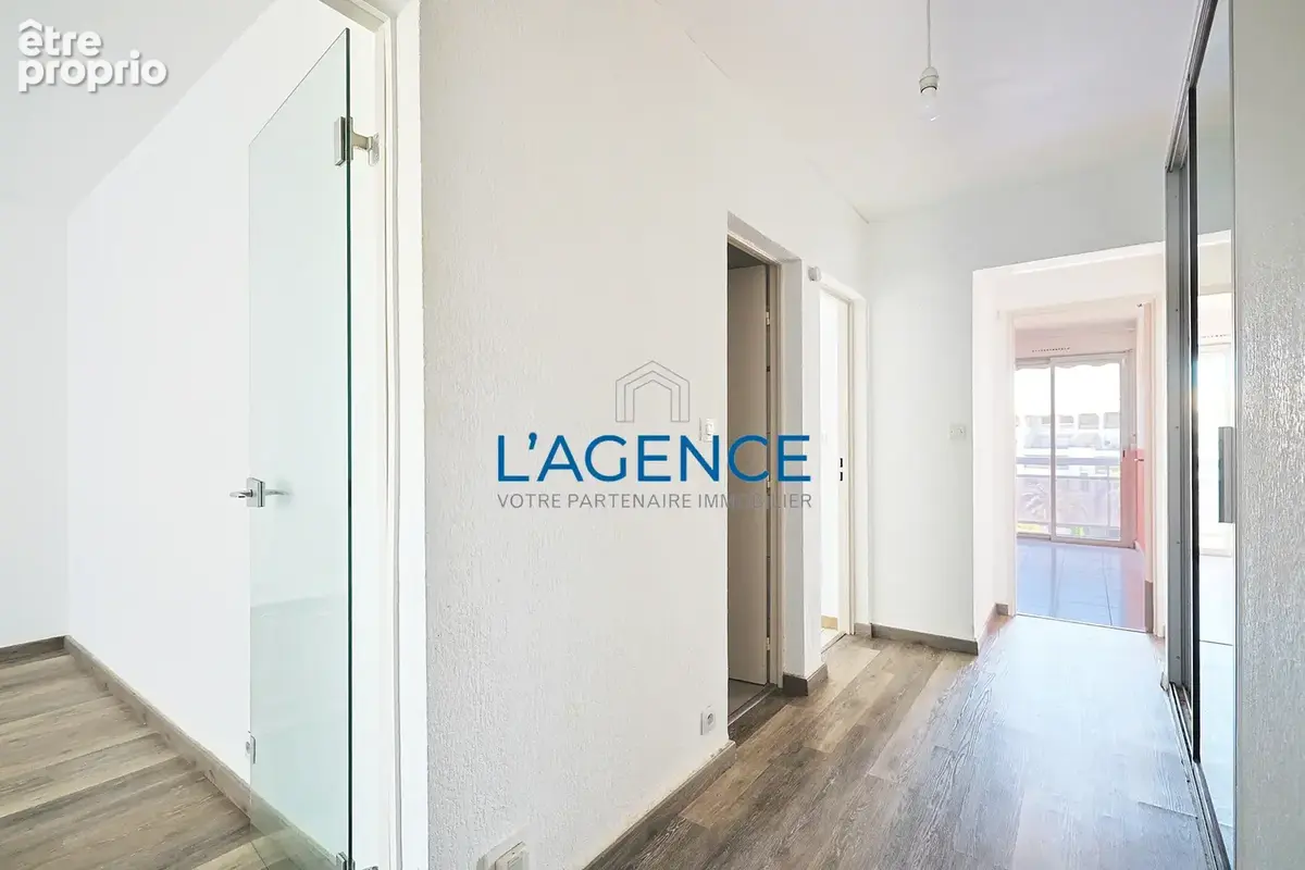 Appartement T4 de 91 m2 en étage avec ascenseur et parking privatif en plein coeur du centre ville - photo 6