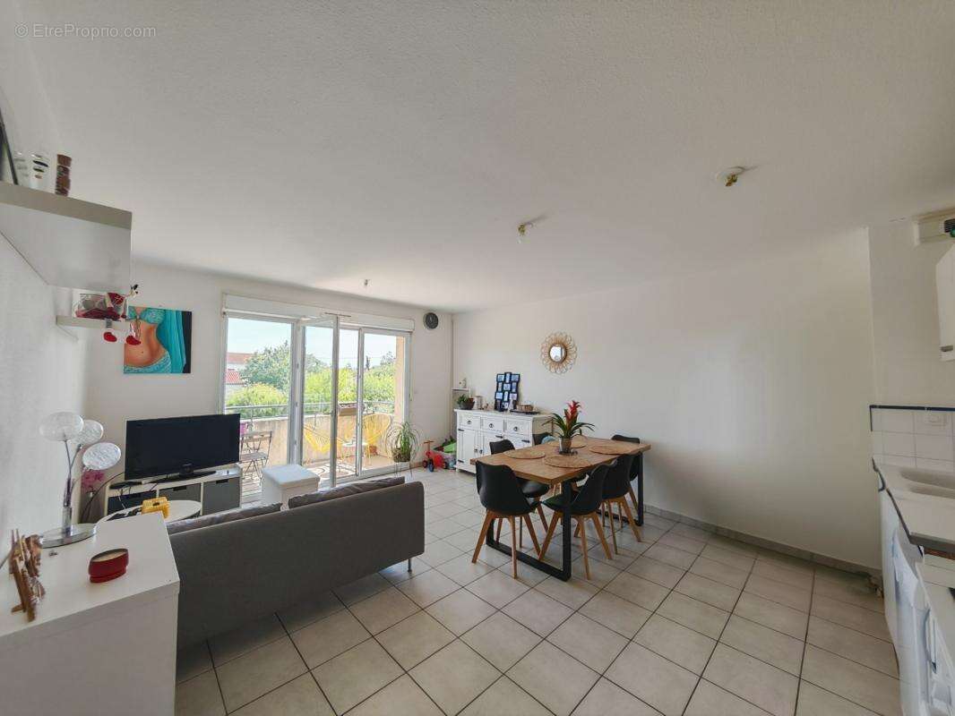 Appartement T3 de 55,74 m² avec balcon et parking privatif – Proche centre-ville (32) - photo 2