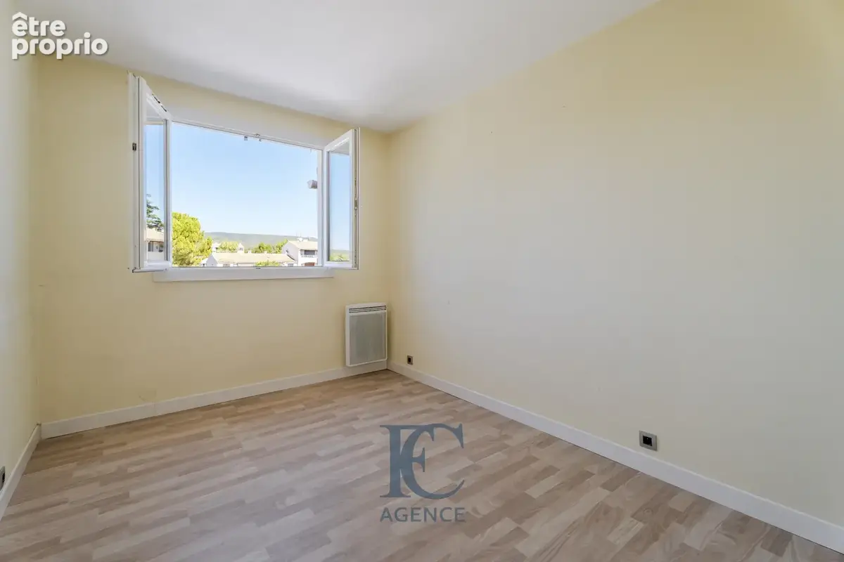 Appartement 70 m2 proche centre-ville et des écoles - photo 4