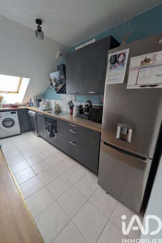 Photo 2 - Appartement à NANTEUIL-LE-HAUDOUIN