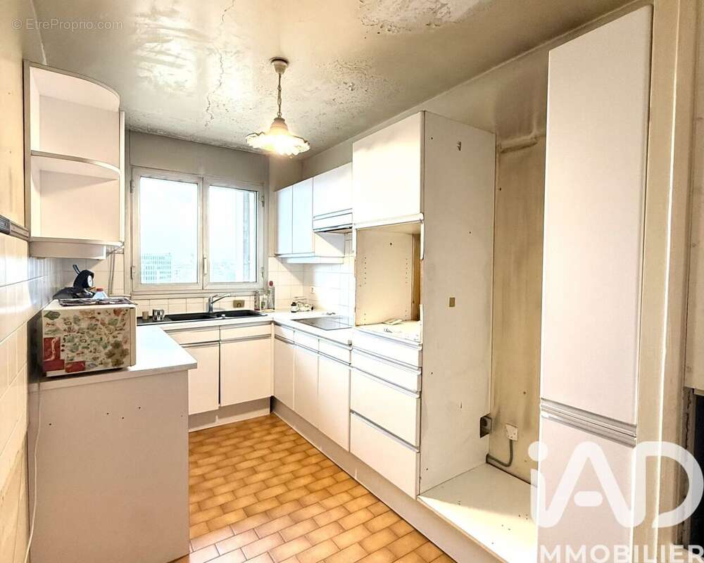 Photo 8 - Appartement à COURBEVOIE
