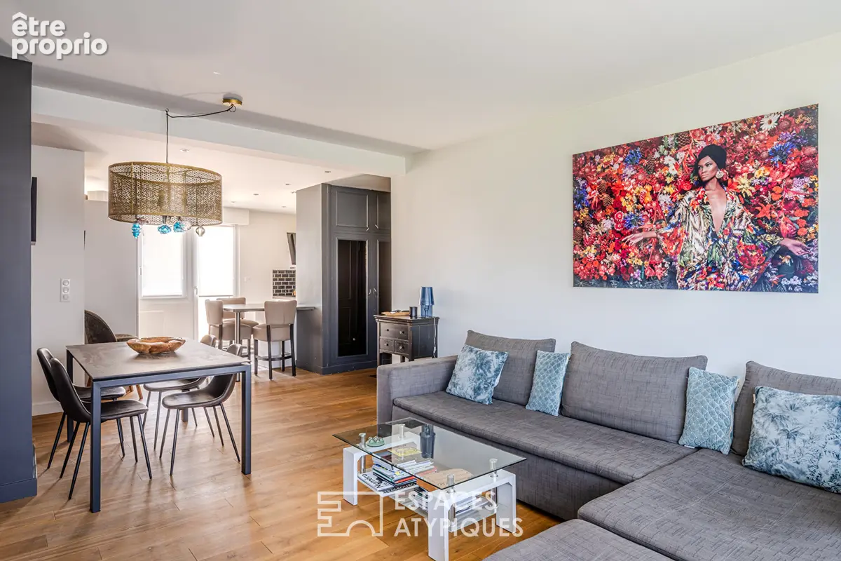 Appartement avec balcons suspendus au sommet d'un immeuble aux lignes modernistes - photo 3