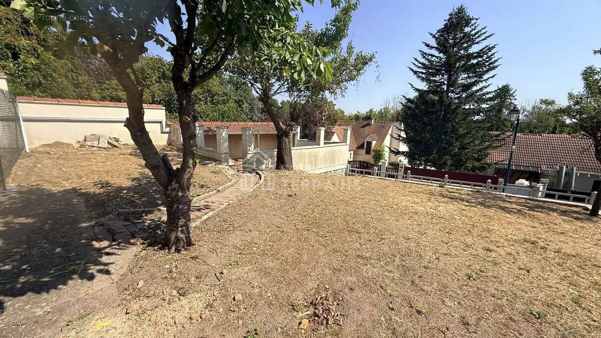 Terrain 282 m² VAUREAL - photo 5