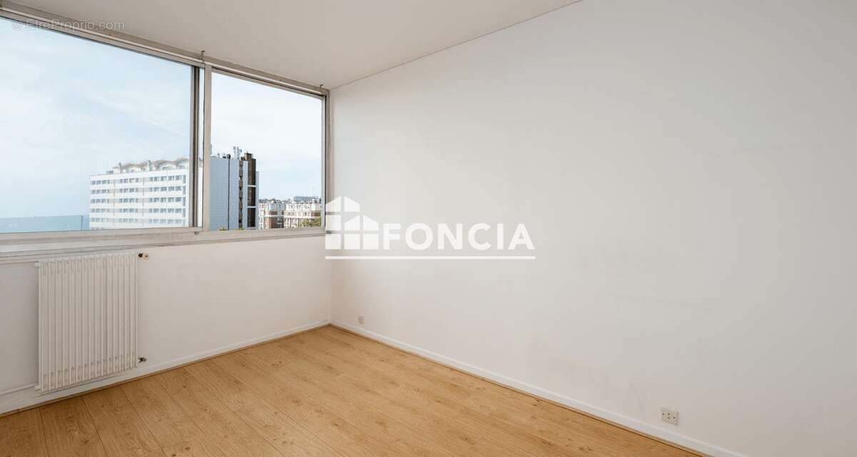 Porte de choisy - 2 pieces (43 m2) vue degagee - cave et parking - photo 9