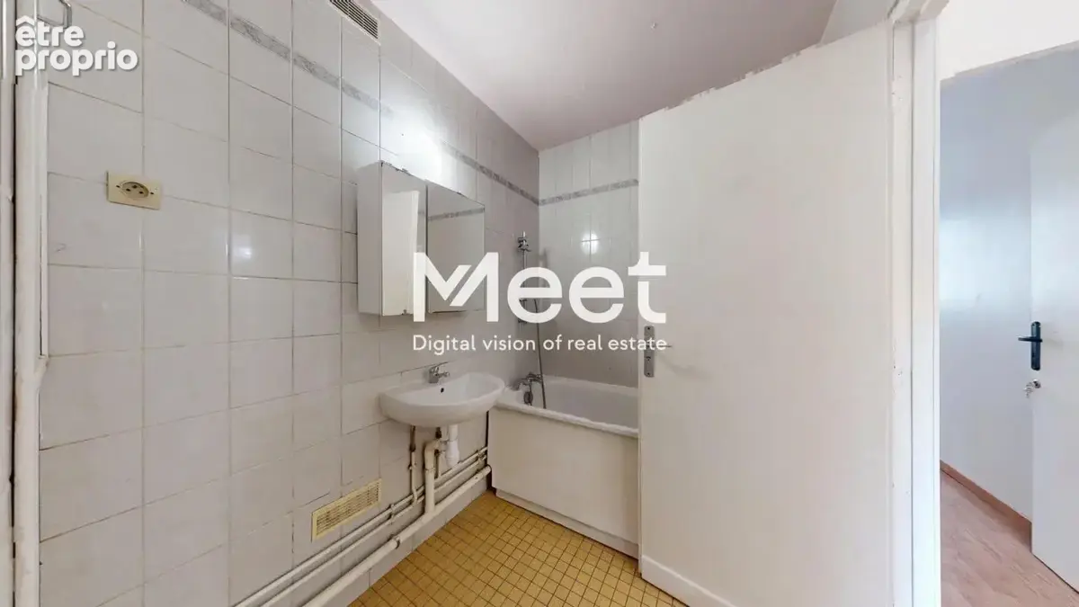 Appartement - 2 chambres - parking - cave - photo 12