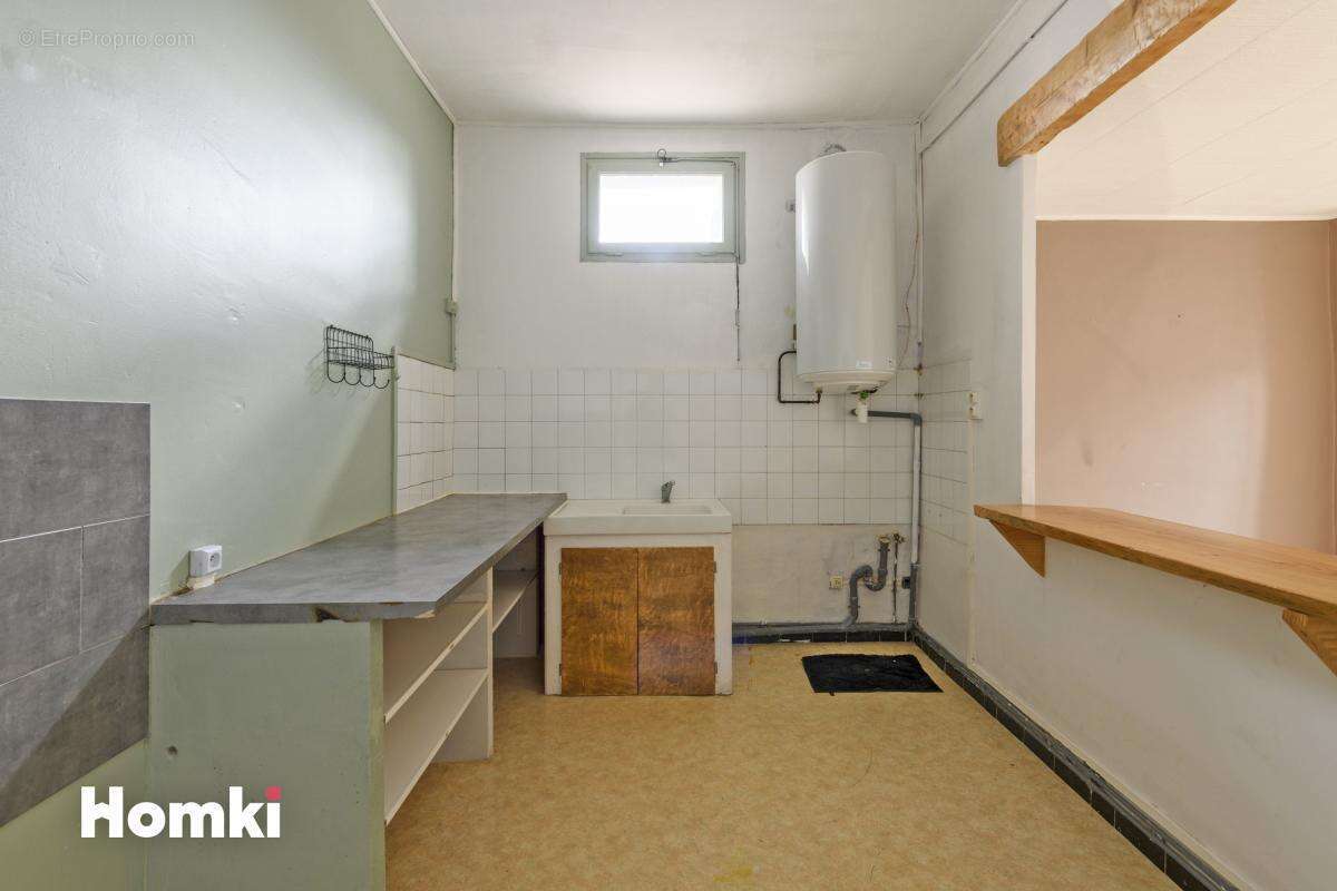 Maison de ville 168m² avec terrain, garages et dépendances sur Saint-Hippolyte-du-Fort - photo 13