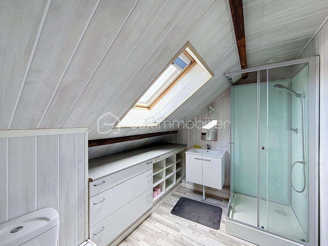 Maison familiale de 103 m² avec 4 chambres, jardin clos et sous-sol complet - photo 10