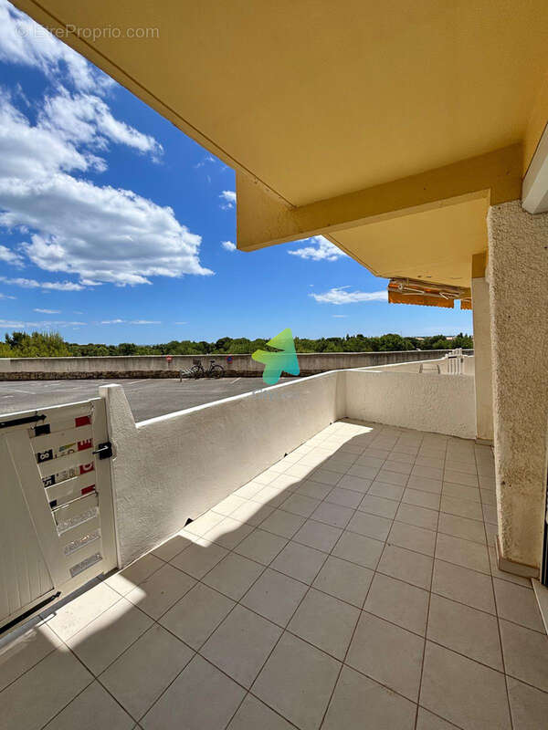 Appartement T3 69.57m2 + Terrasse + Cellier + Parkings - photo 2