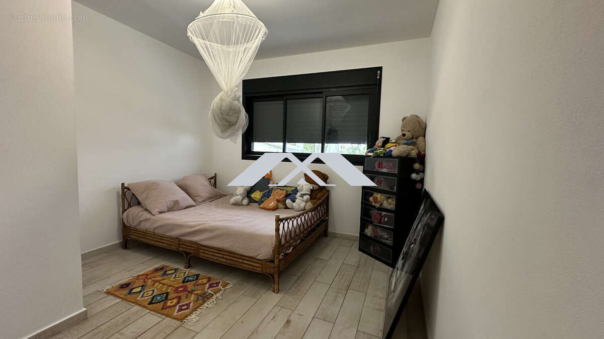 Maison 69 m² à Le Tampon  - photo 7