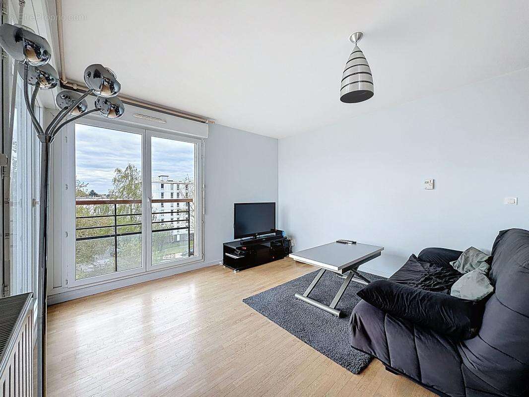 Appartement T3 lumineux avec balcon, box et cave - photo 2