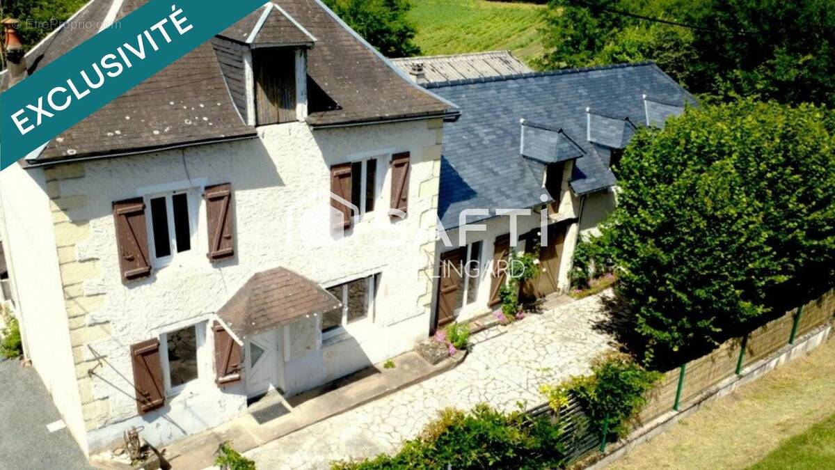 Photo 1 - Maison à TERRASSON-LAVILLEDIEU