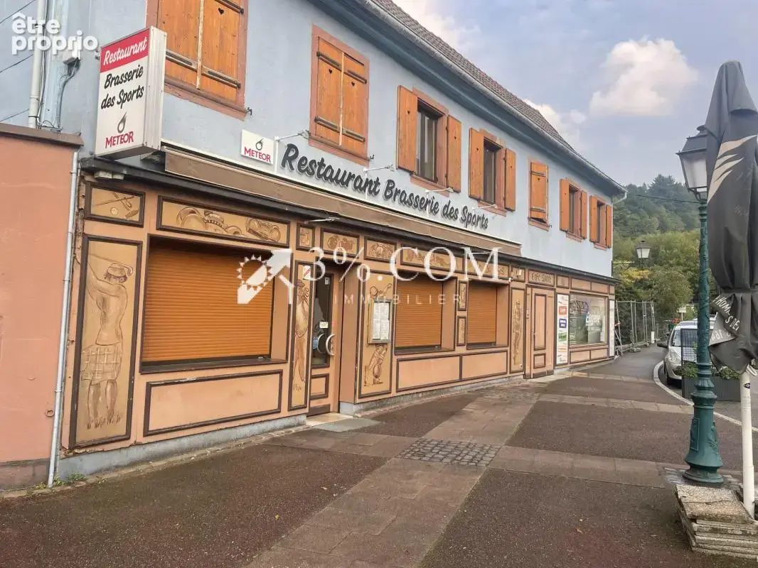 IMMEUBLE DE RAPPORT  Commerces et 3 appartements - photo 8